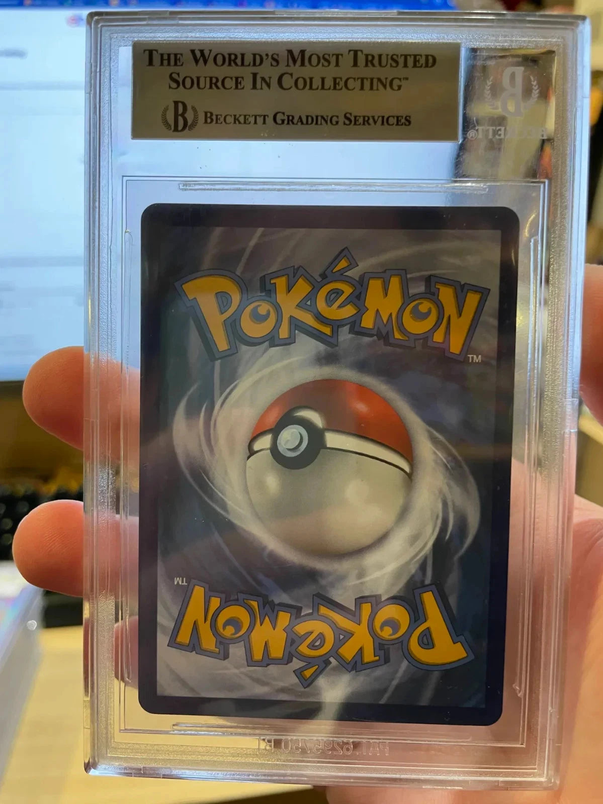 Pokemon - Charizard 4/102 Holo Rare Celebration BGS 9 Off-centered Pristine