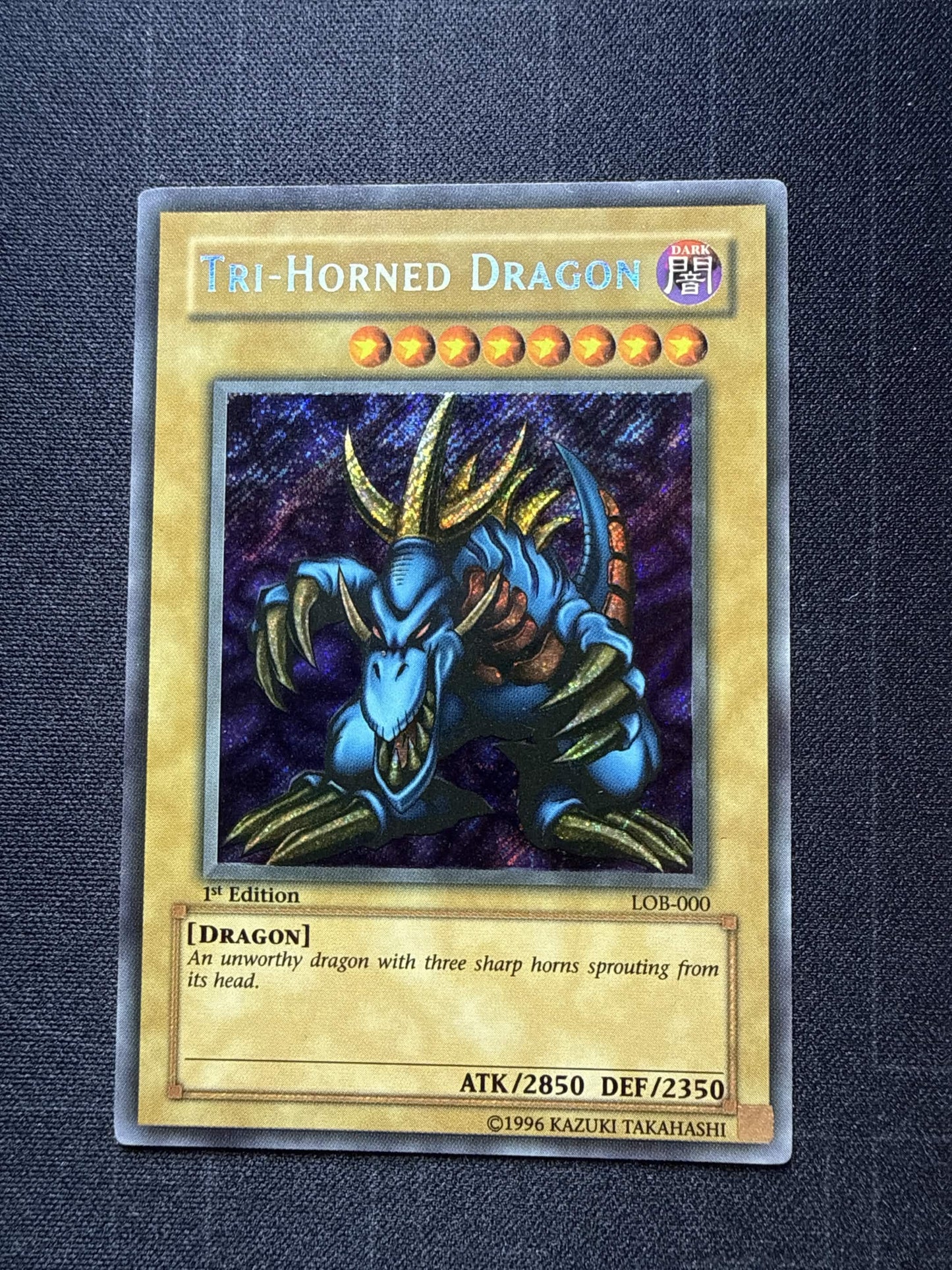 Tri-Horned Dragon (LOB-000) (LOB-000) - The Legend of Blue Eyes White Dragon 1st Edition VLP (WAVY FADED)