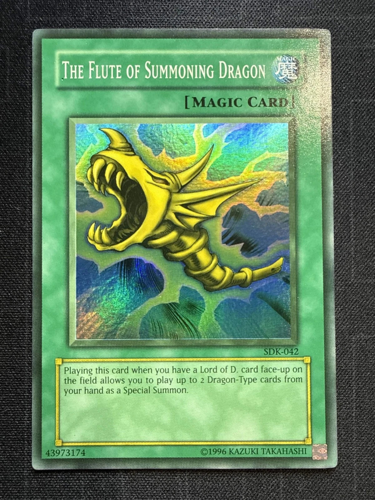 Yugioh The Flute of Summoning Dragon (SDK-042) Unlimited (Faded) LP