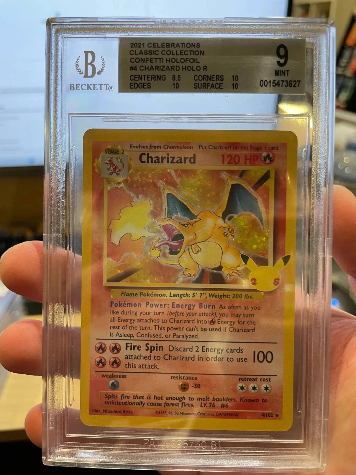 Pokemon - Charizard 4/102 Holo Rare Celebration BGS 9 Off-centered Pristine