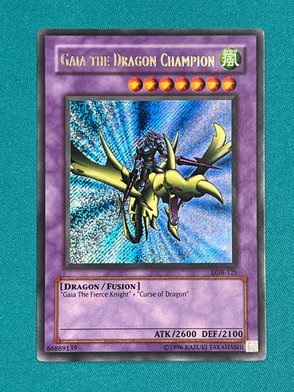 Yugioh Gaia The Dragon Champion LOB-125 Secret Rare LP GOLD NAME