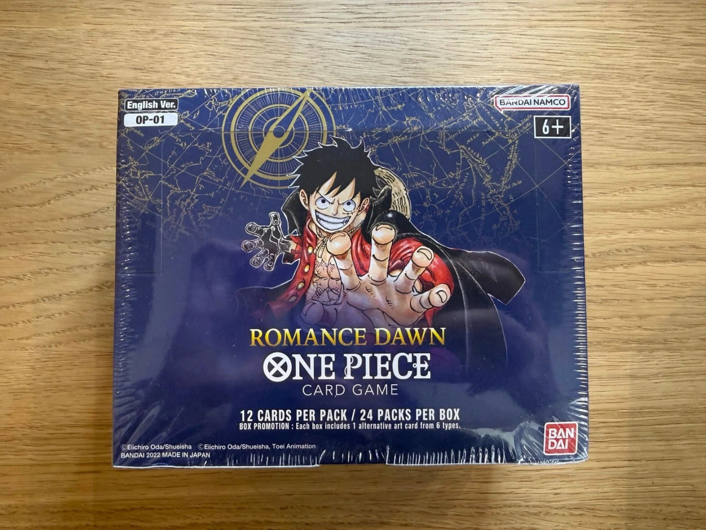 One Piece TCG Romance Dawn Booster Box W/ Acrylic Case (White Bottom) (Sealed)