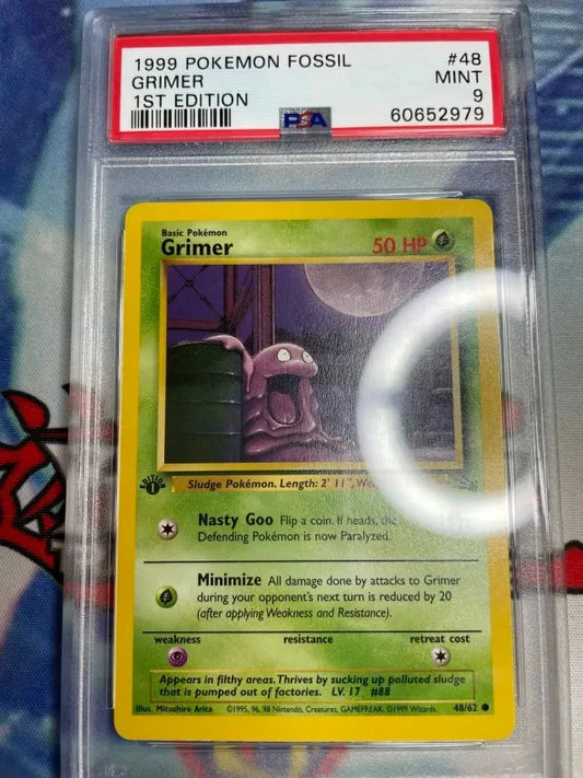 Pokemon - Grimer 48/62 Fossil 1st Edition PSA 9